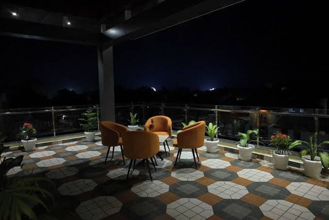 Hotel room with breakfast included - rooftop view room at Hotel Days Inn Sarnath Varanasi
